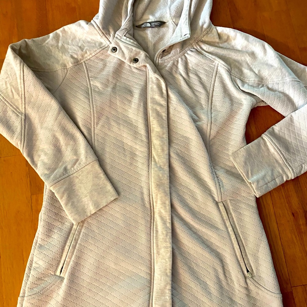 Cream colored, quilted fleece  North Face jacket